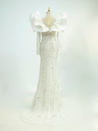White Couture Mermaid Gown with Oversized Ruffle Shoulders - Hand-Beaded Formal Dress