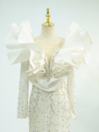 White Couture Mermaid Gown with Oversized Ruffle Shoulders - Hand-Beaded Formal Dress